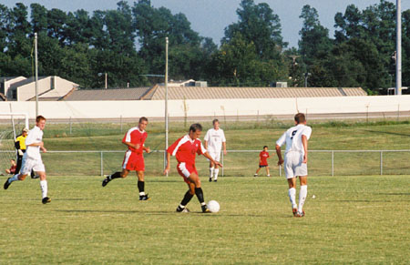 Senior Kekec Zivkovic (10) advances the ball downfield. - Photo by Uncredited