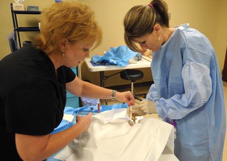 Nursing students work on simulations in Providence Hall with Molly Wright, assistant professor of nursing. - Photo by Morris Abernathy