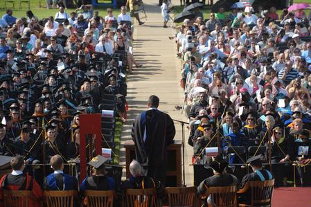 Guest, graduates, faculty and family gather on the Great Lawn for summer graduation. - Photo by Morris Abernathy