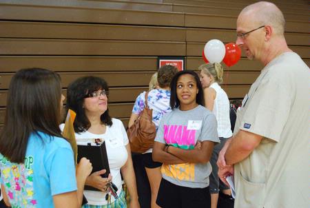 Paul Mayer, director of health services, explains to new students and their families how Union's health clinic works.  - Photo by Abigail Harris