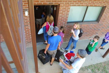 New students move into their dorm rooms with the help of their families, faculty, staff, and upperclassmen. - Photo by Abigail Harris