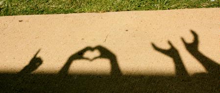 Taking a break from moving in, Union students play with shadows to express how they feel about Union.  - Photo by Ebbie Davis