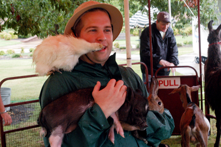 Mark VanderHaar, Director of Student Programs, has gone to the animals at Fall Fest 2003. - Photo by Jonathan Blair