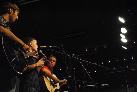 New students Josh Rhyne, Cody Hill, and Jonathan Kerr perform during new student Open Mic at Barefoots Joe. - Photo by Victoria Stargel
