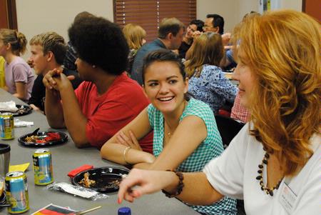 Bekka Duong, incoming freshman, visits with Julie Glosson, associate professor of Spanish, during the International Focus lunch. - Photo by Victoria Stargel