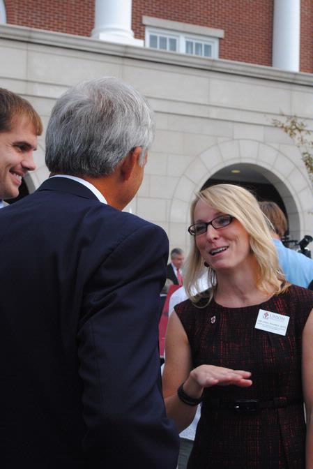 Kim Jones, assistant professor of pharmacy practice, chats with members of the Union and Jackson community at the dedication of Providence Hall.   - Photo by Victoria Stargel