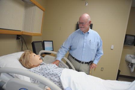 Polk Glover, long-time friend of Union University, gets a tour of the third floor of Providence Hall after the dedication of the building.  - Photo by Morris Abernathy