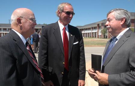 David Blackstock, advancement officer, Jerry Gist, Jackson city major, and Frank Wagster chat before the dedication of the Hope Residence Complex. - Photo by Beth Spain