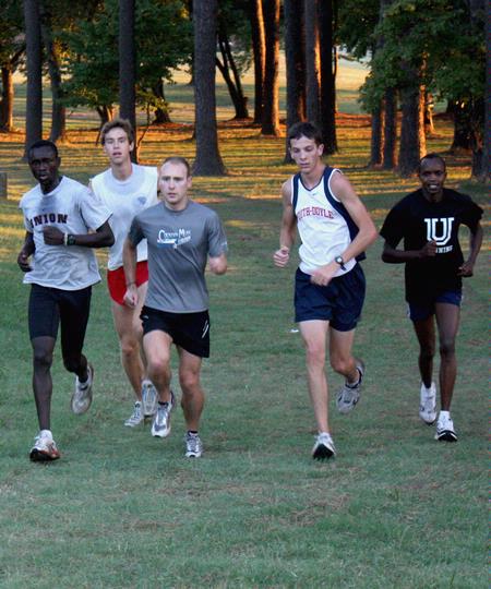 The men's cross country team prepares for the fall 2010 season.  - Photo by Ebbie Davis
