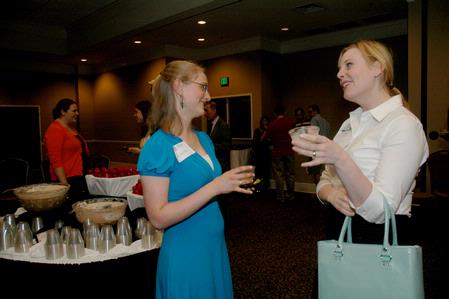 Liana Saffel, junior, chats with Kimberly Thornbury, vice president for student services and dean of students, during the President's Reception. - Photo by Deanna Santangelo