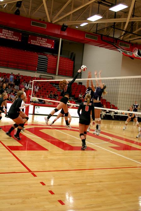 Anna Sims, junior, spikes the ball over the net during Union's match against Lyon College, which the Lady Bulldogs won 3-1. - Photo by Deanna Santangelo