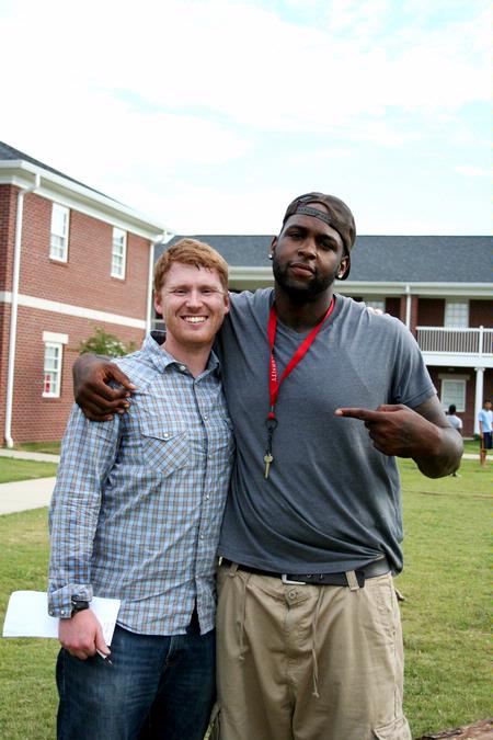 Shane Burrell, junior sports management major, poses with Luke Pruett, residence director, at the Watters Great Outdoors event. - Photo by Deanna Santangelo