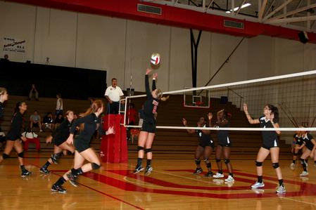Emmie Moroski sets up a spike for Ana Sims during a game against Martin Methodist, which Union won 3-1. - Photo by Deanna Santangelo