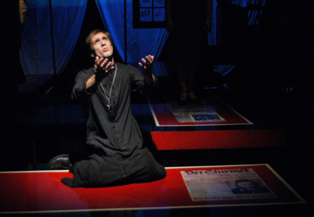 Ryan Schunemann as the Priest in <i>Die Ratzel</i>. - Photo by Jim Veneman