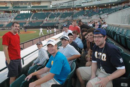 Members of Alpha Tau Omega enjoy West Tenn Diamond Jaxx Union Night at Pringles Park.  - Photo by Beth Spain