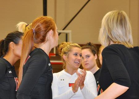 Kelsey Duling cheers on her teammates between sets of a Union volleyball match. - Photo by Steven Aldridge