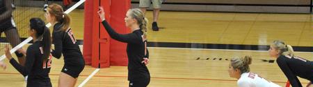 Setter Emmie Moroski (center) calls the play as Union awaits serve. - Photo by Steven Aldridge