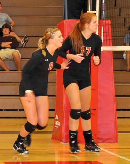 Emmie Moroski (8) and Anna Sims move into position. - Photo by Steven Aldridge