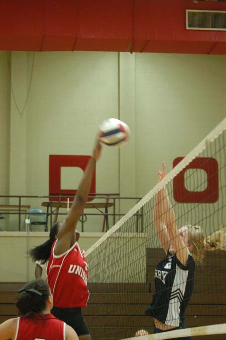 Gladys Wandera (12) skies above everyone to go for the kill.   - Photo by Steven Aldridge