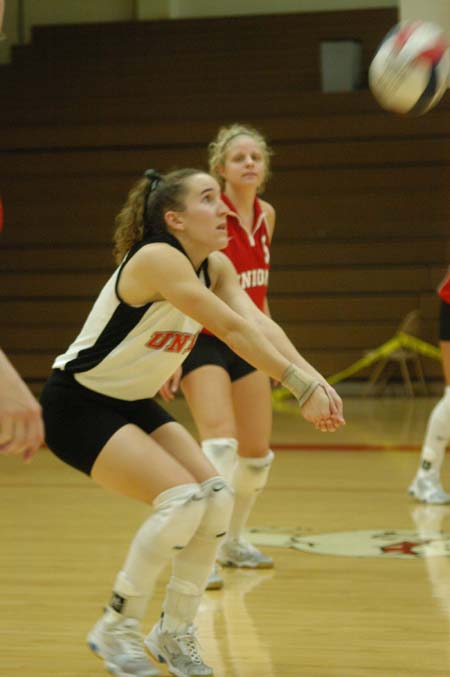 Allison Shein (1), a junior for the Lady Bulldogs, passes a shot to the front line.  Linsday Holmes (5) looks on. - Photo by Steven Aldridge