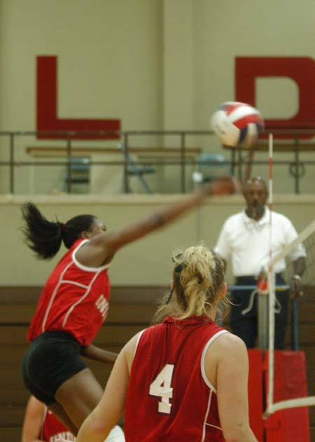 Union kills leader, Gladys Wandera (11) goes for another.  Lindsay Stahlberg (4) looks on. - Photo by Steven Aldridge