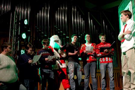 "The Jolly Men of Jarman" sing Christmas carols at the holiday themed All-Sing event. - Photo by Deanna Santangelo