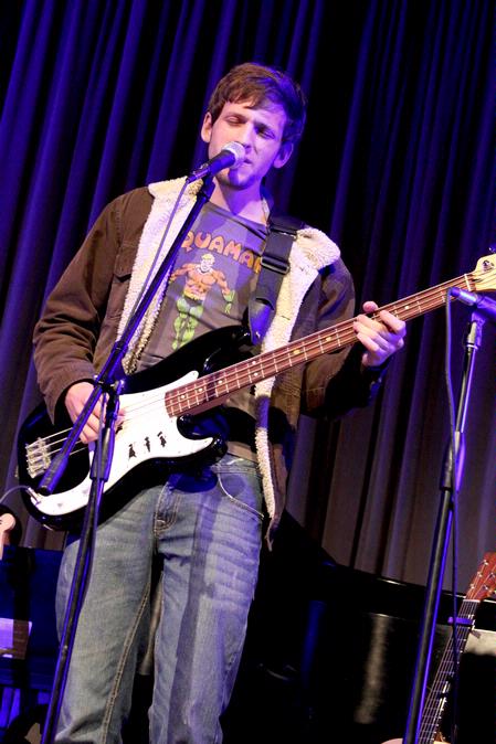 Rob Griffith, freshman English major, performs with the band Flying Colours during All-Sing.  - Photo by Deanna Santangelo