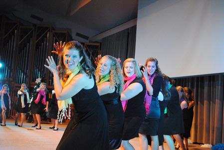 The women of Kappa Delta perform "Snow" from the popular Bing Crosby film "White Christmas." The act is part of several holiday themed performances for All-Sing.  - Photo by Victoria Stargel