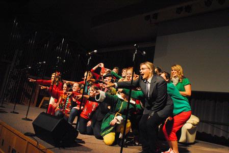 The women of Chi Omega perform their large group All-Sing act. Their final song for the holiday themed event was "All I Want for Christmas."  - Photo by Victoria Stargel