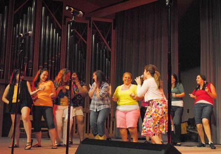 "On Holidays" performs in All-Sing 2010, hosted by Sigma Alpha Iota. The group performed four songs with the theme of Summertime. "On Holidays" won the top award for Large Group. - Photo by Victoria Stargel