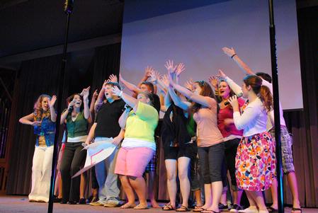 "On Holidays" performs their large group act in All-Sing 2010, hosted by Sigma Alpha Iota. The group performed four songs with the theme of Summertime, and won the top award for large group. - Photo by Victoria Stargel