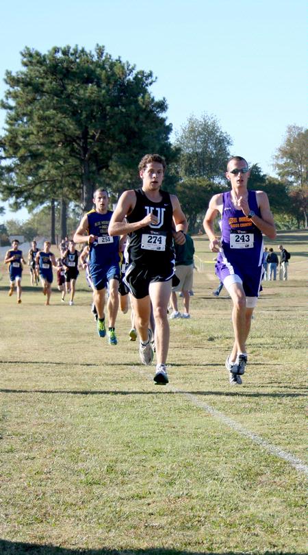 The Bulldog cross country team works hard in a race.  - Photo by Deanna Santangelo