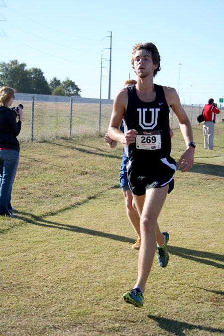 Caleb Creel, freshman theology major, runs in a Bulldog cross country meet.  - Photo by Deanna Santangelo