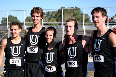The men's cross country team members stand together after finishing a meet.  - Photo by Deanna Santangelo