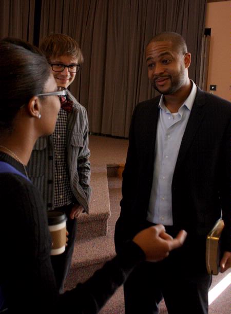 Brian Loritts, lead pastor of Fellowship Bible Church of Memphis, talks to Greg Thornbury, vice president for spiritual life, and Melanie Taylor, sophomore sports ministry major, after Faith in Practice chapel. - Photo by Ebbie Davis