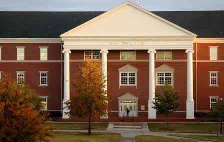After a hard rain, the setting sun casts a gorgeous golden light over the Jackson campus.  - Photo by Beth Spain