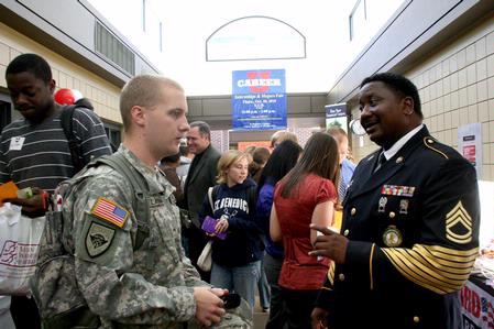 Aaron Rowland, sophomore DMS major, talks with the representative from the National Guard during Career U.  - Photo by Deanna Santangelo