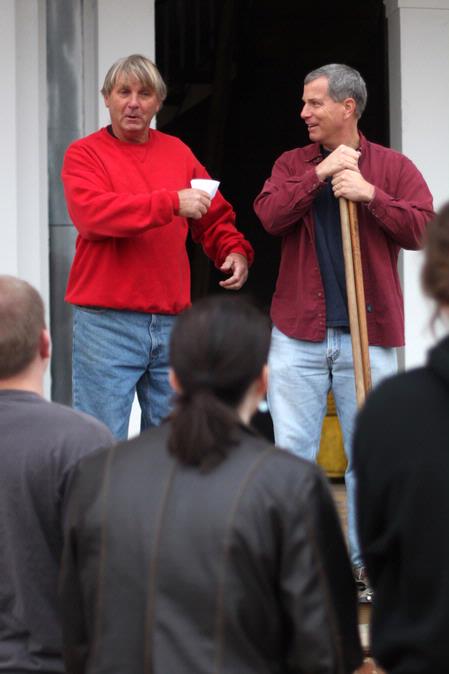 The project manager for the restoration of the 1800s home at Casey Jones Village and Dr. David Thomas give directions to history students volunteering for Campus and Community Day.  - Photo by Kristi McMurry Woody