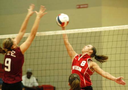 Union senior Jennie Glassey (8) tries for a point in Union's 3-0 loss to Lee. - Photo by Steven Aldridge