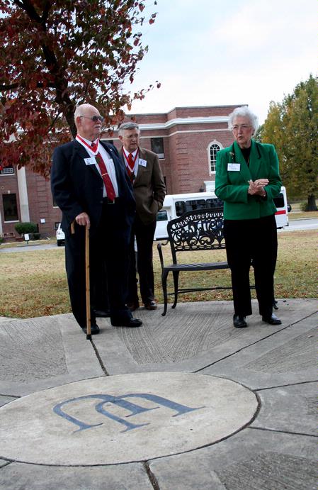 Ramona Mercer, volunteer tour guide and alum 1952, talks to the class of 1961 about the Union University circle in the old downtown Jackson campus. - Photo by Deanna Santangelo