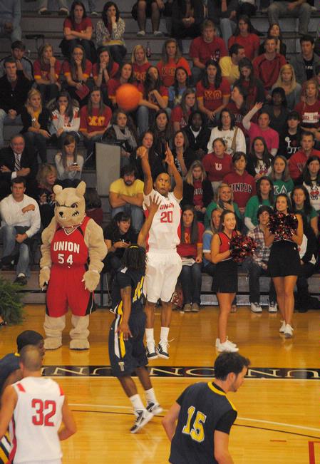 Stan McNeil goes up for a shot as the homecoming crowd watches. The Bulldogs were victorious over Truett-McConnell College 79-69. - Photo by Victoria Stargel