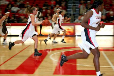 Kayla Hudson runs the ball down the court during the homecoming game against University of St. Francis. The Lady Bulldogs won 83-57.  - Photo by Deanna Santangelo