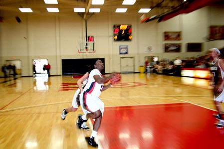 Lavanda Ross goes for a layup during the homecoming game against University of St. Francis. The Lady Bulldogs won the game 83-57.  - Photo by Deanna Santangelo