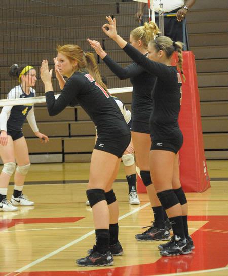 The Lady Bulldog volleyball team stands ready for play to begin.  - Photo by Morris Abernathy