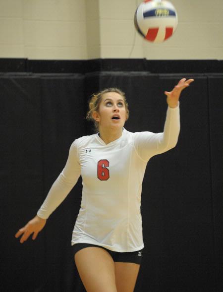 Kelsey Duling serves the ball. - Photo by Morris Abernathy