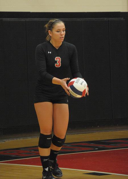 Heather Lieberman serves the ball. - Photo by Morris Abernathy