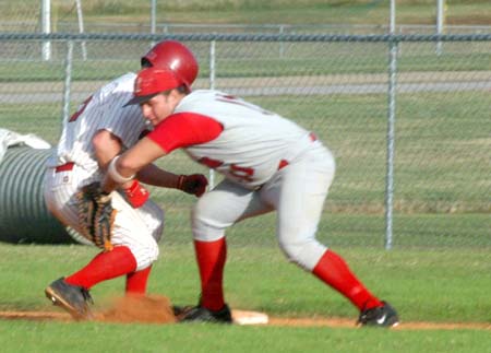 Senior first baseman Josh Allen applies the tag on a pickoff attempt. - Photo by Steven Aldridge