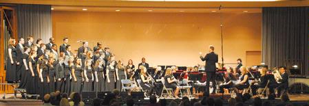 Symphonic Band, Proclamation and Madison Academic High School's "First Class" chorus, perform "Gloria" from the Heiligmesse and Strike Up the Band during the Fall concert, conducted by Chris Mathews.  - Photo by Victoria Stargel