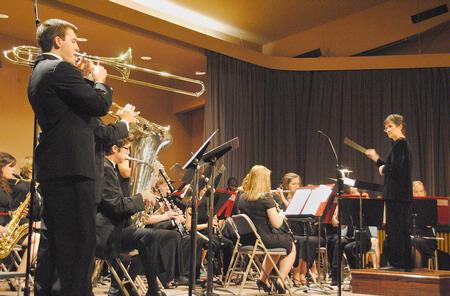 Union's Symphonic Band performs "Satchmo!" during Fall Concert as Jan Warren, instructor of symphonic band conducts. - Photo by Victoria Stargel