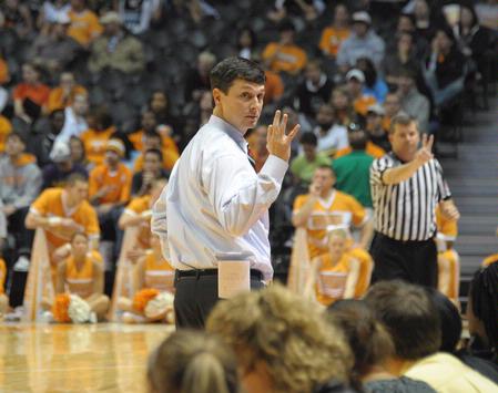 Mark Campbell, head women's basketball coach, talks to his players from the sidelines during the exhibition game against the Lady Vols. - Photo by Morris Abernathy